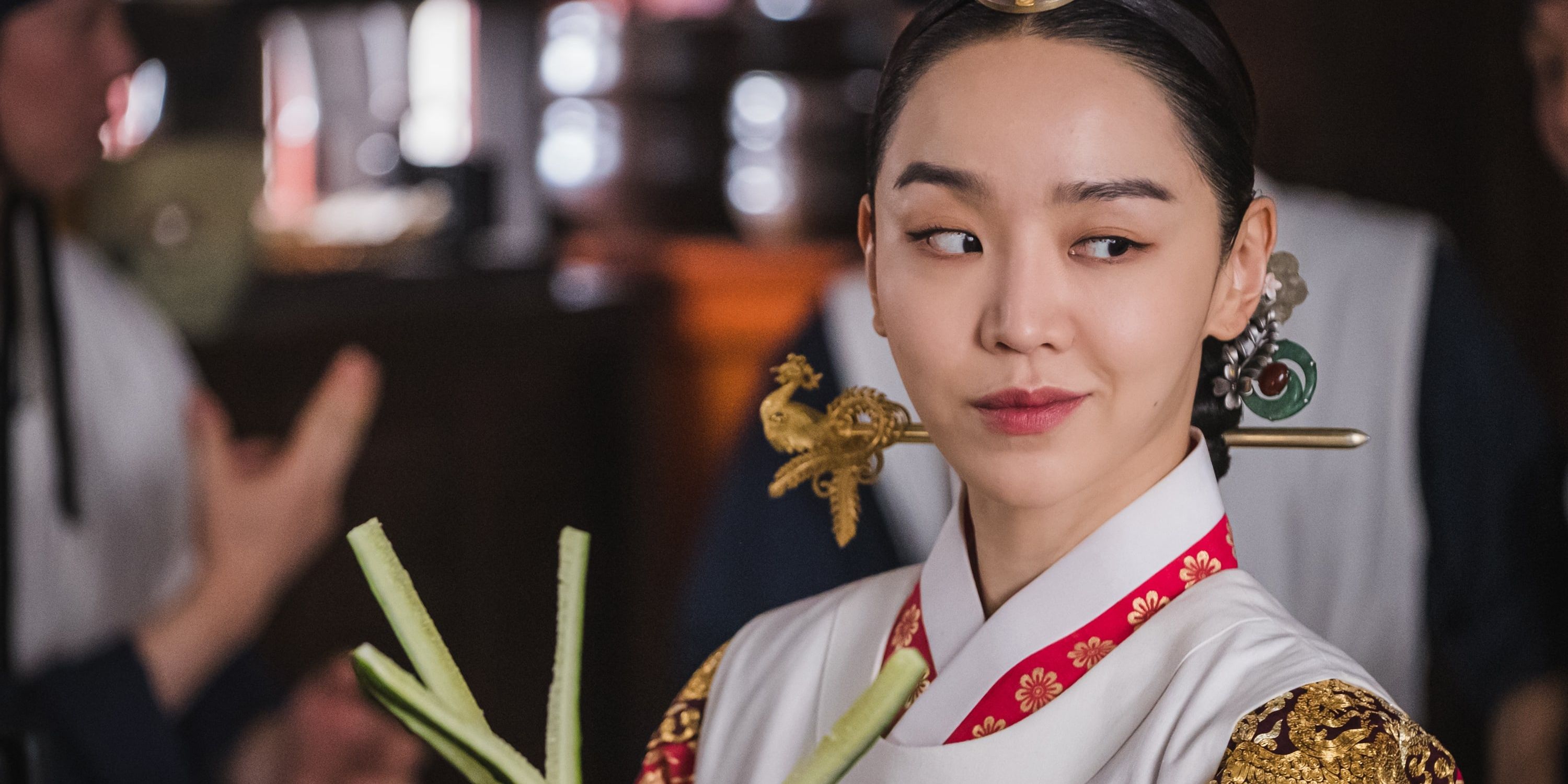 Shin Hye-sun smiling at a person offscreen in an episode of Mr. Queen