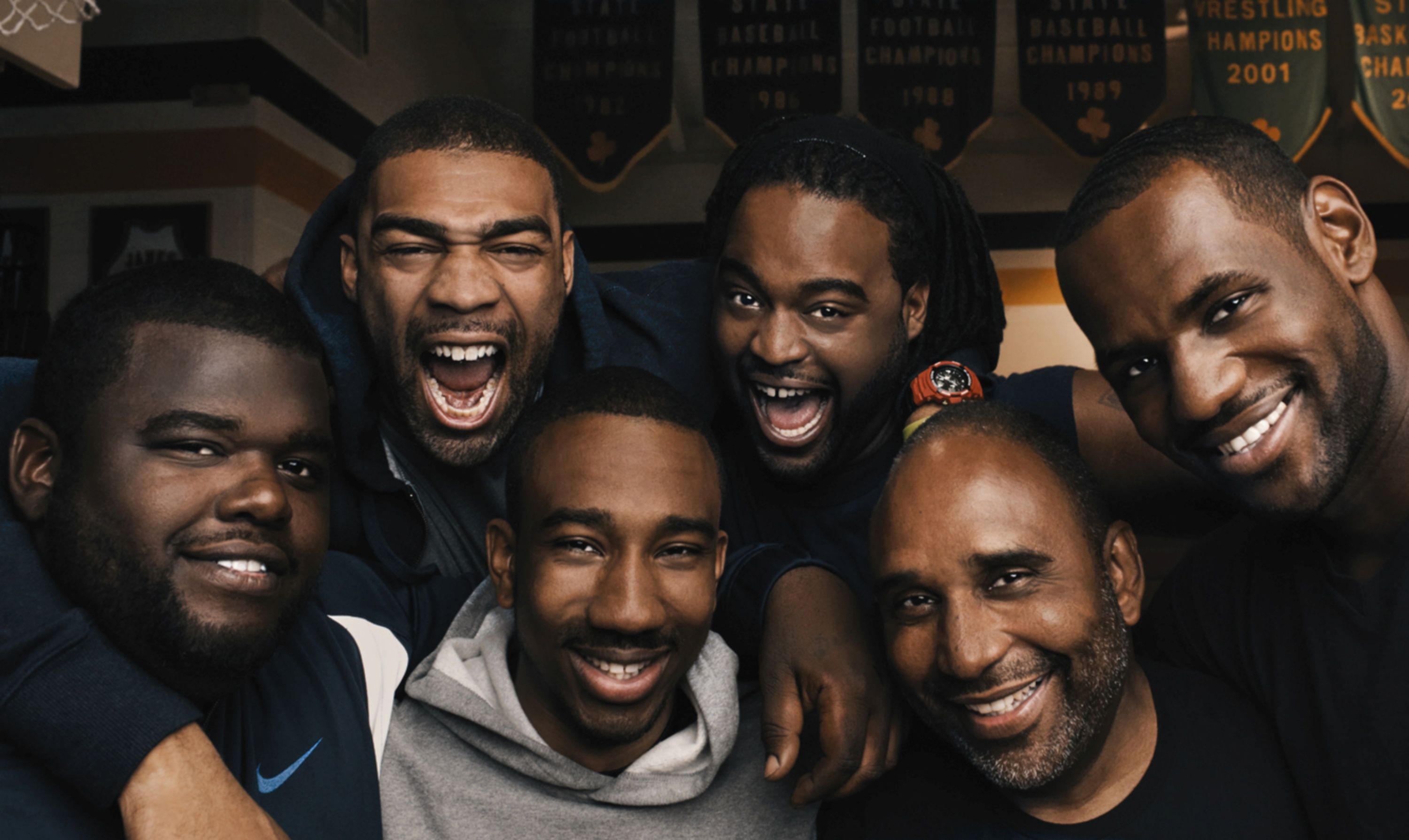 LeBron James with the Fab Five and Coach Dru Joyce, who are the subjects of Shooting Stars