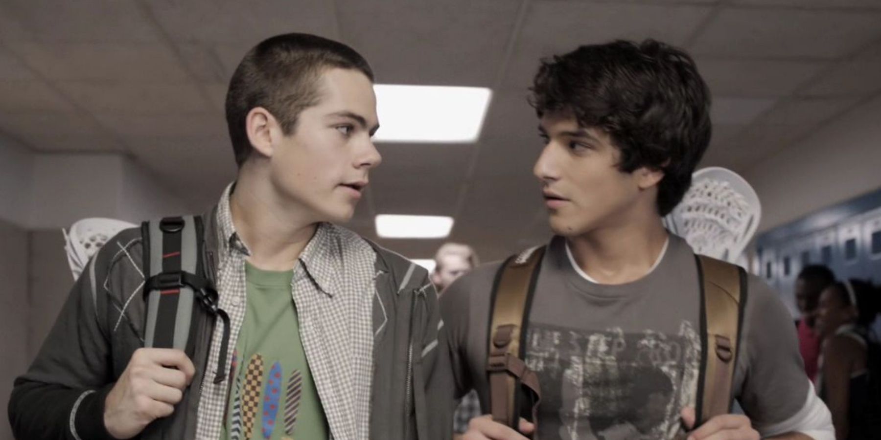 Dylan O'Brien and Tyler Posey stand next to each other in Teen Wolf