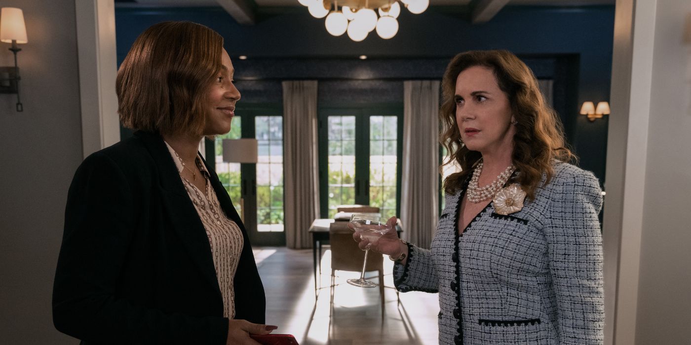 Tiffany Haddish and Elizabeth Perkins talking to each other