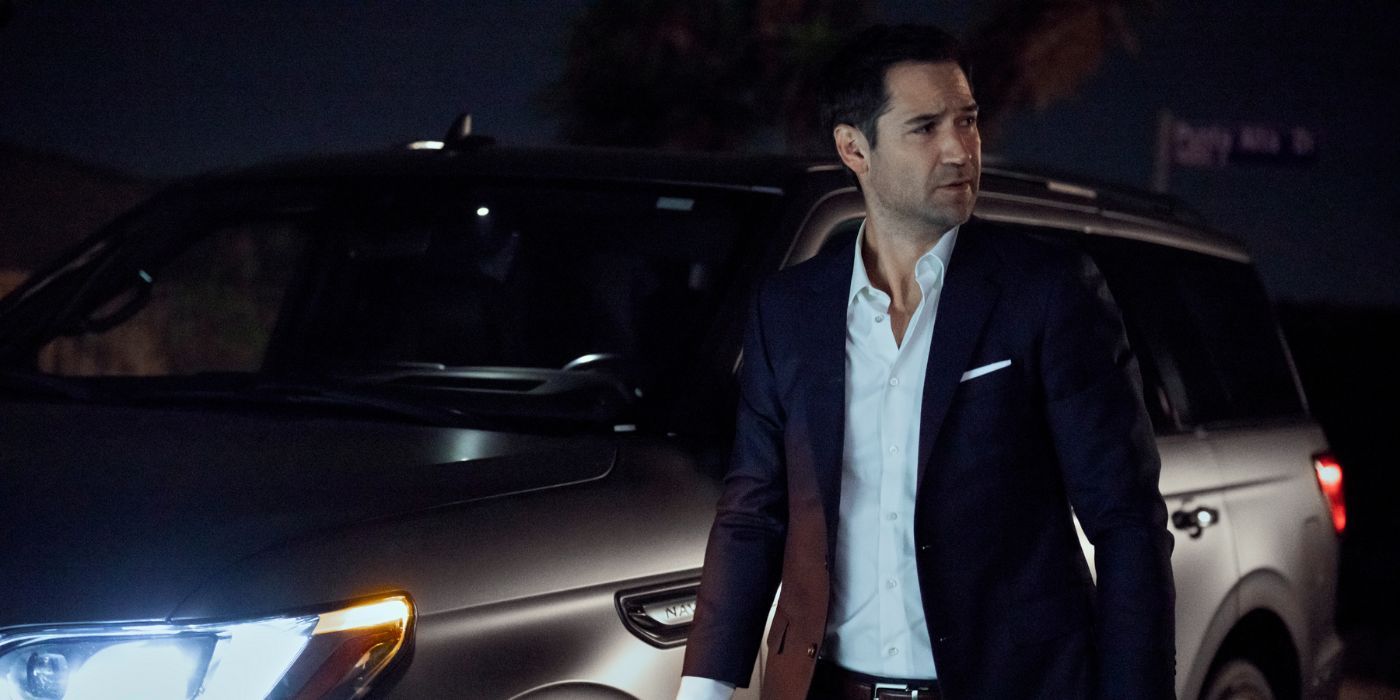 Mickey steps out of his car at night in The Lincoln Lawyer Season 2