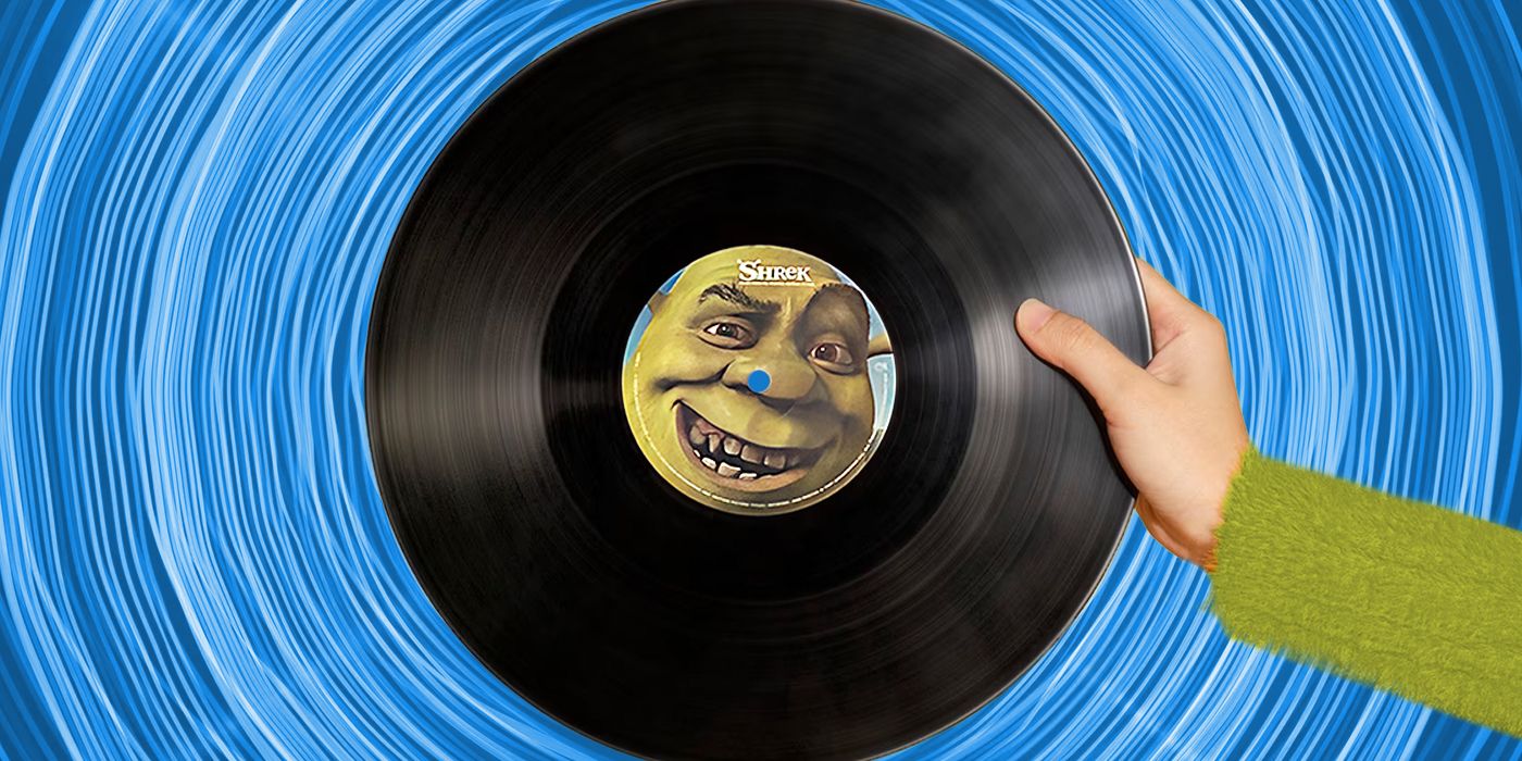 person holding vinyl with shrek's face in the center of the vinyl
