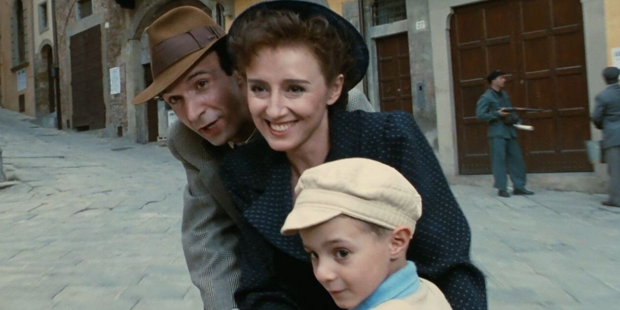 Roberto Benigni, Nicoletta Braschi et Giorgio Cantarini dans La vie est belle