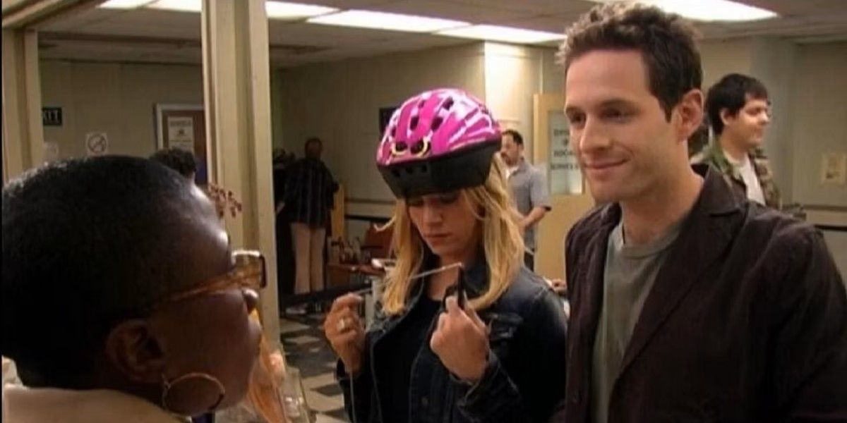 Dee (Kaitlin Olson) and Dennis (Glenn Howerton) at the welfare office on 'It's Always Sunny in Philadelphia'