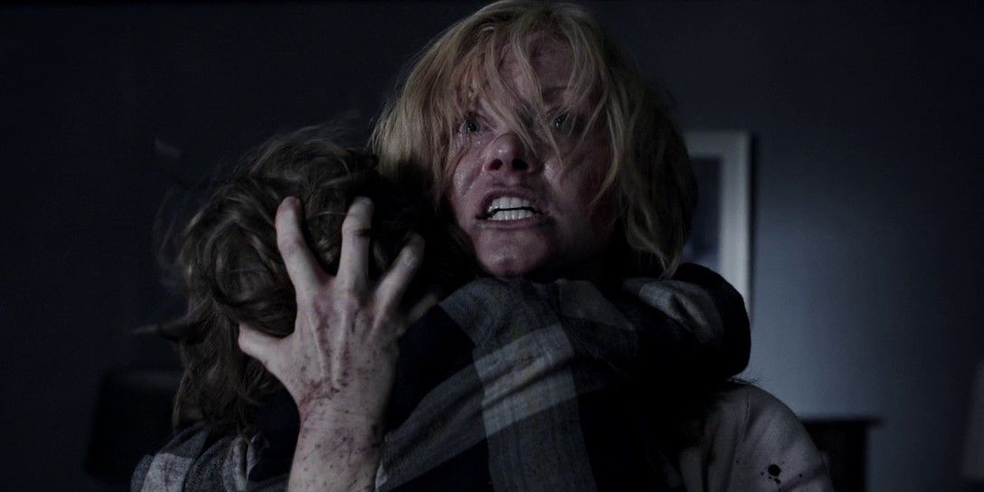 Still from "The Babadook": Amelia (Essie Davis) clutches her son and screams.