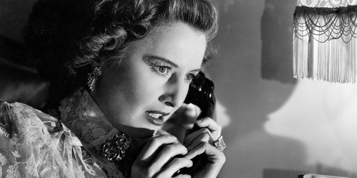 Barbara Stanwyck as Leona Stevenson looking distressed while on the phone in Sorry, Wrong Number