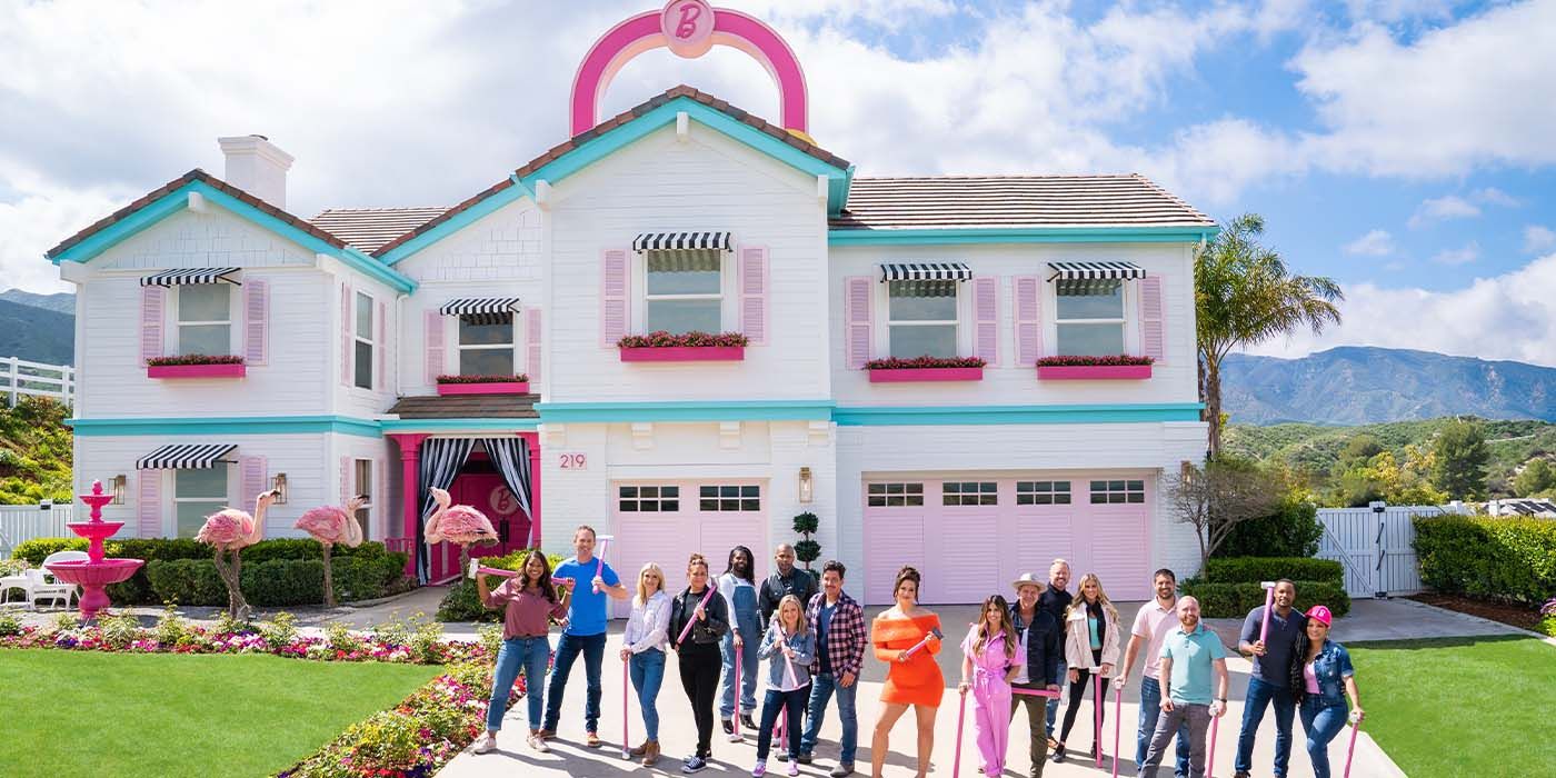 The participants of Barbie Dreamhouse Challenge stand outside the house