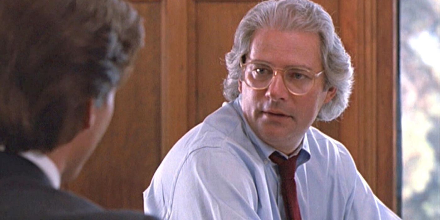 Barry Levinston sitting at a courtroom table in Rain Man