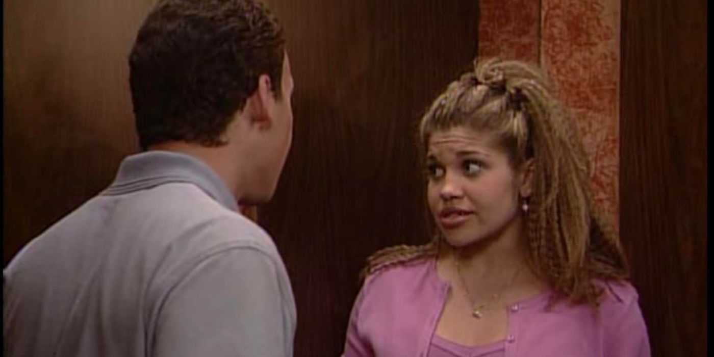 Cory (Ben Savage) and Topanga (Danielle Fishel) talking in an elevator in Boy Meets World