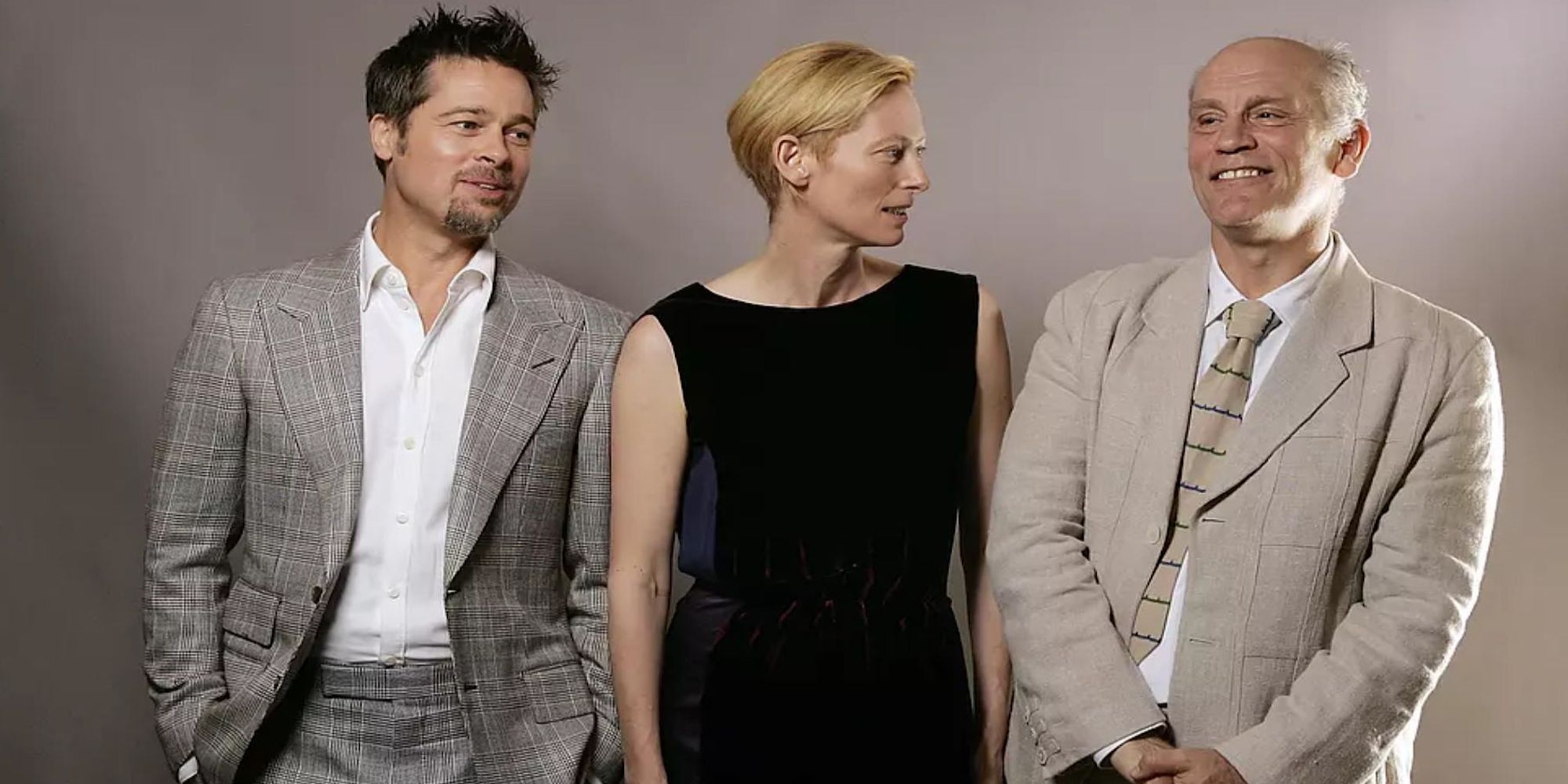 Burn After Reading Promotional Image, featuring from L to R: Brad Pitt, Tilda Swinton, and John Malkovich