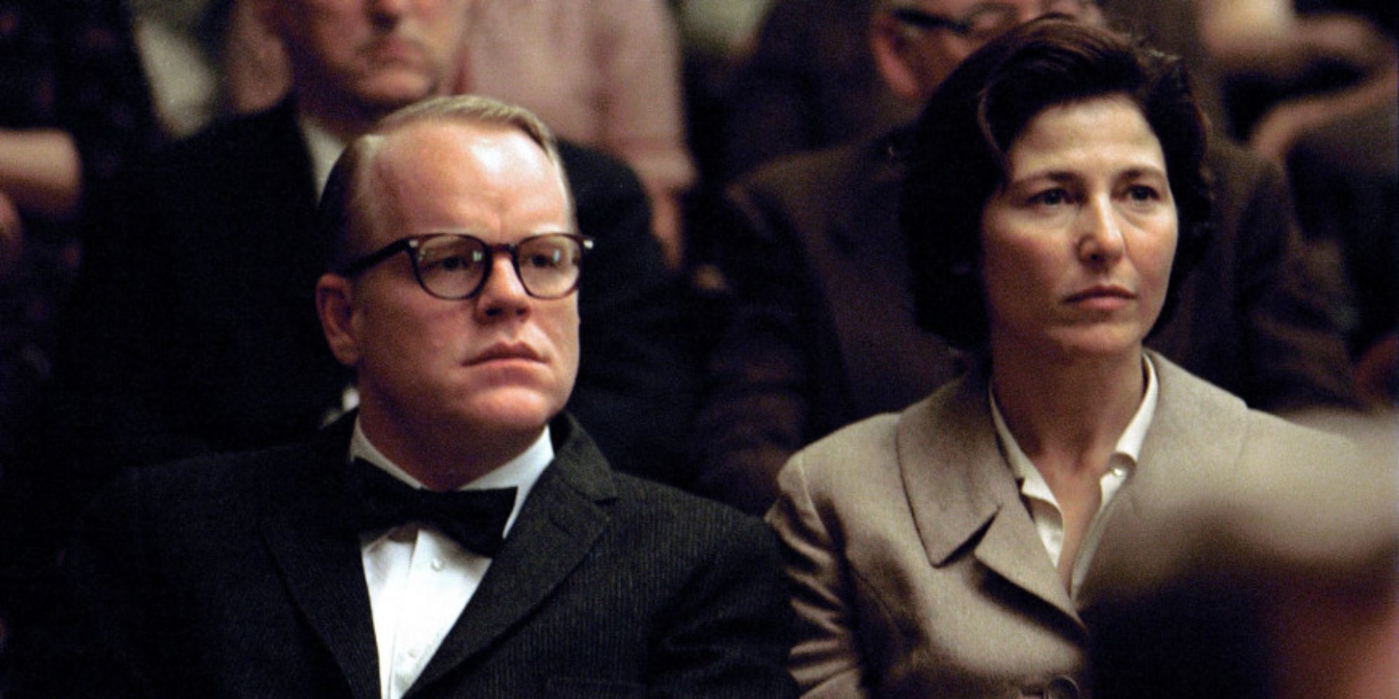 Truman Capote (Philip Seymour Hoffman) sits next to Harper Lee (Catherine Keener) in 'Capote'