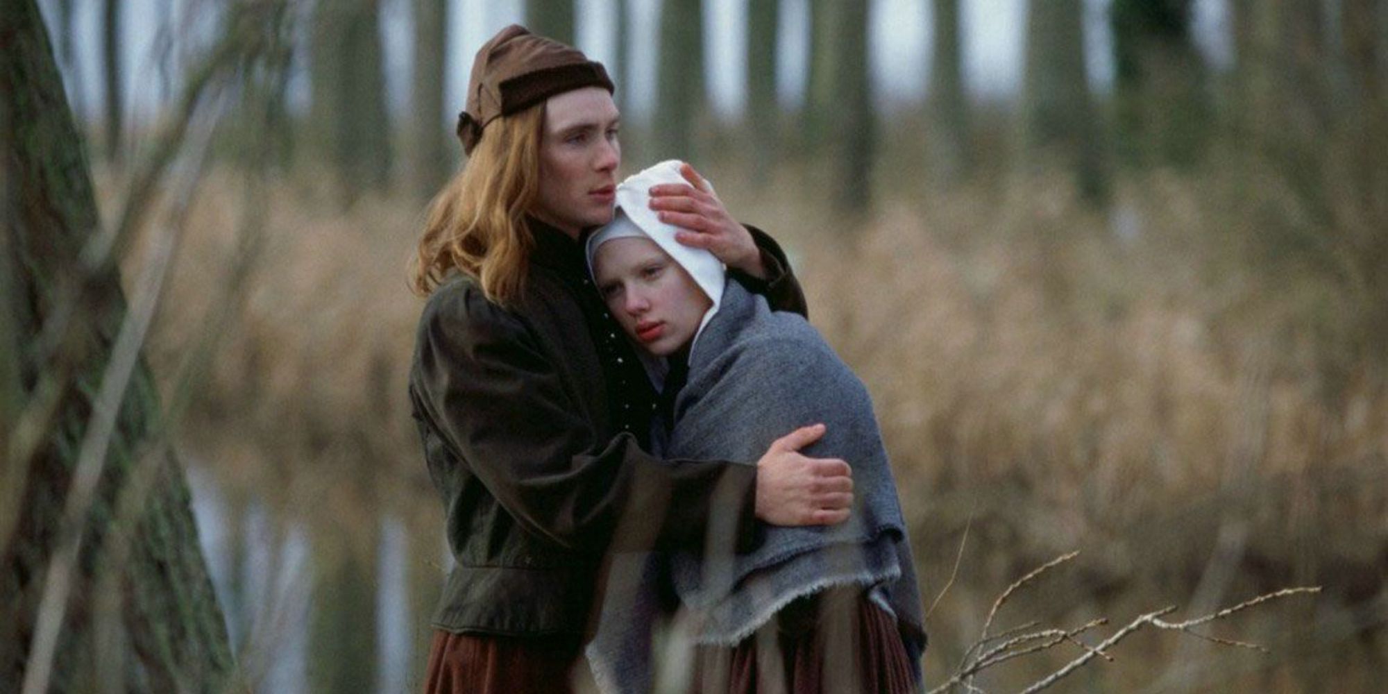 Cillian Murphy as Pieter hugging Scarlett Johansson as Griet in Girl with a Pearl Earring