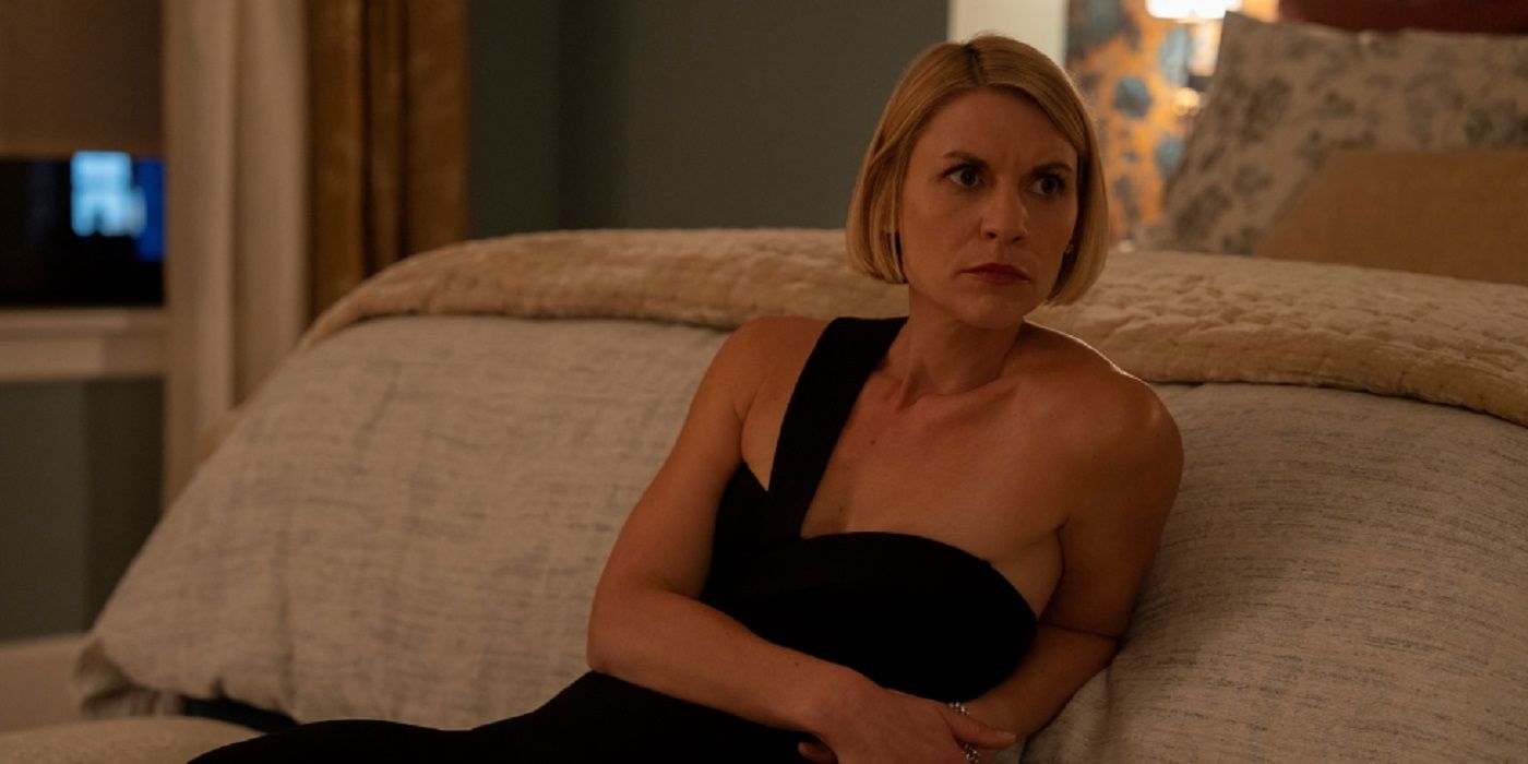 Claire Danes sits on the floor and leans on a bed in Full Circle