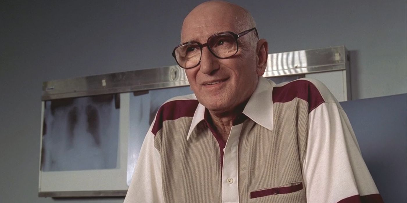 Dominic Chianese sitting in a doctor's room in The Soprano
