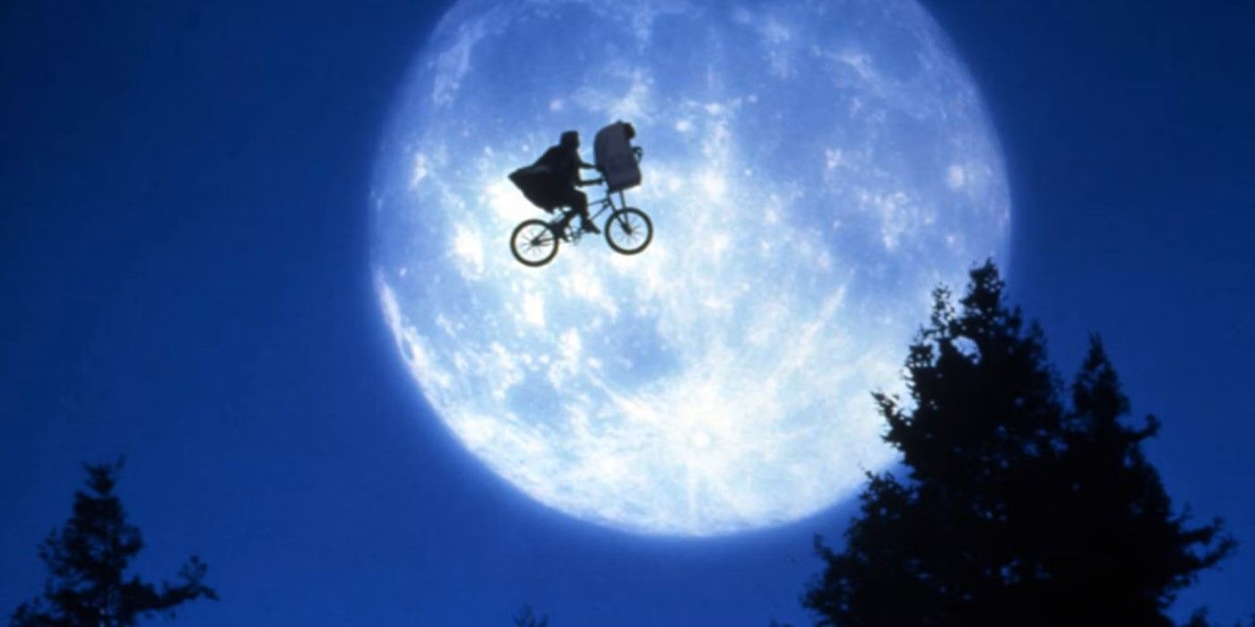 Elliot and E.T. ride the bike across the moon