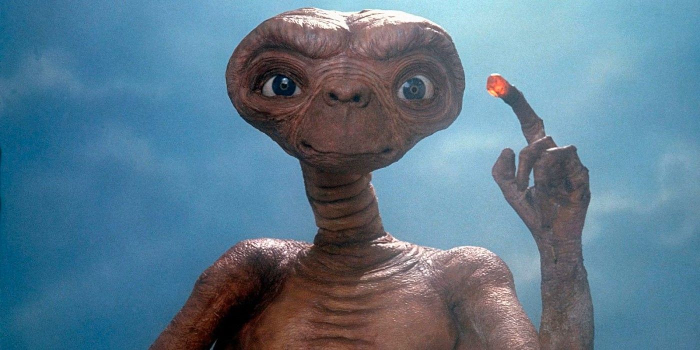 E.T. holds up his glowing finger in 'E.T. The Extra-Terrestrial'