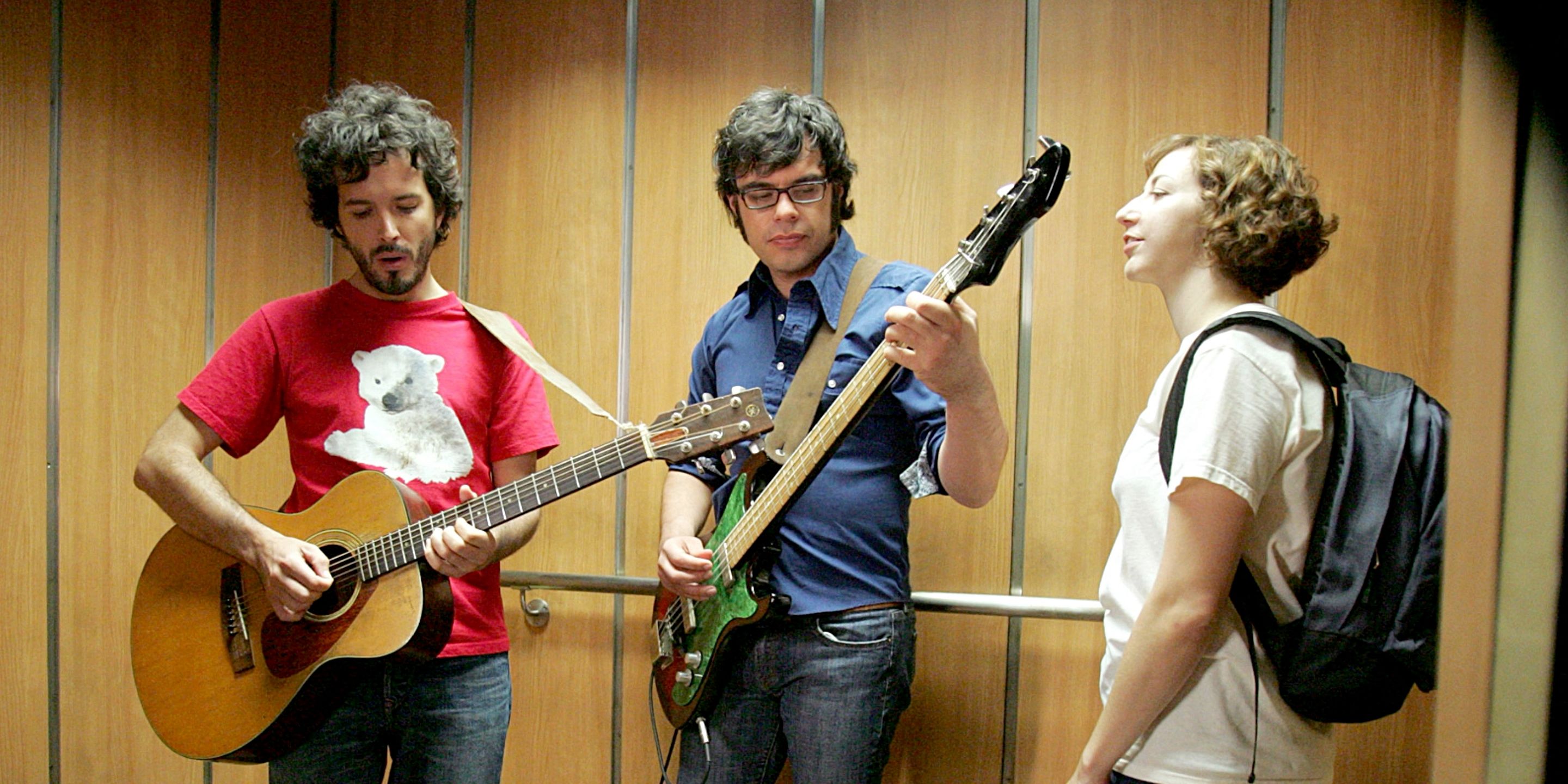 Bret and Jemaine with Mel (Kristen Schaal), their stalker/fan in 'Flight of the Conchords'