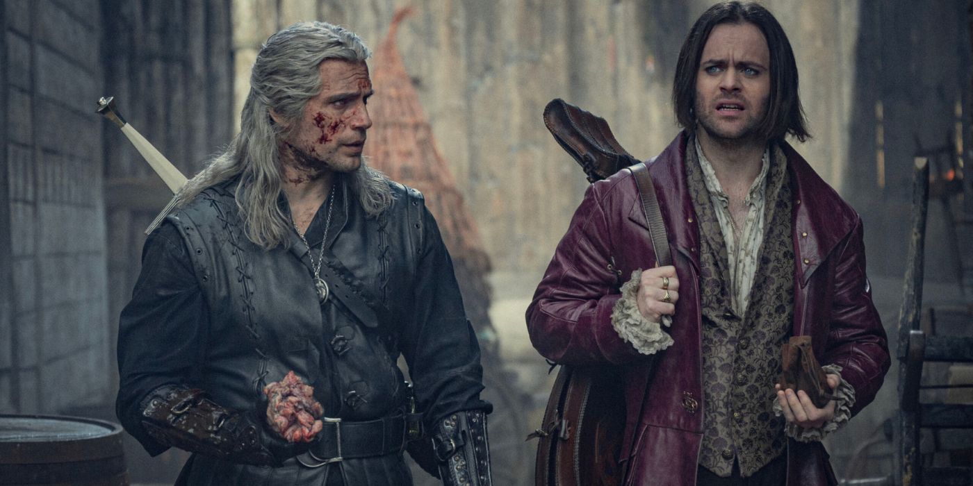 Henry Cavill and Joey Batey as Geralt and Jaskier walking towards the camera in The Witcher