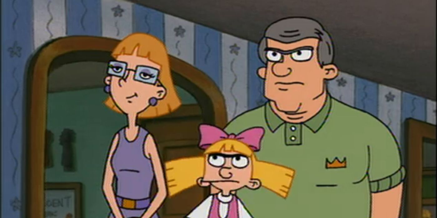 Helga frowning and standing in between her parents, Miriam and 