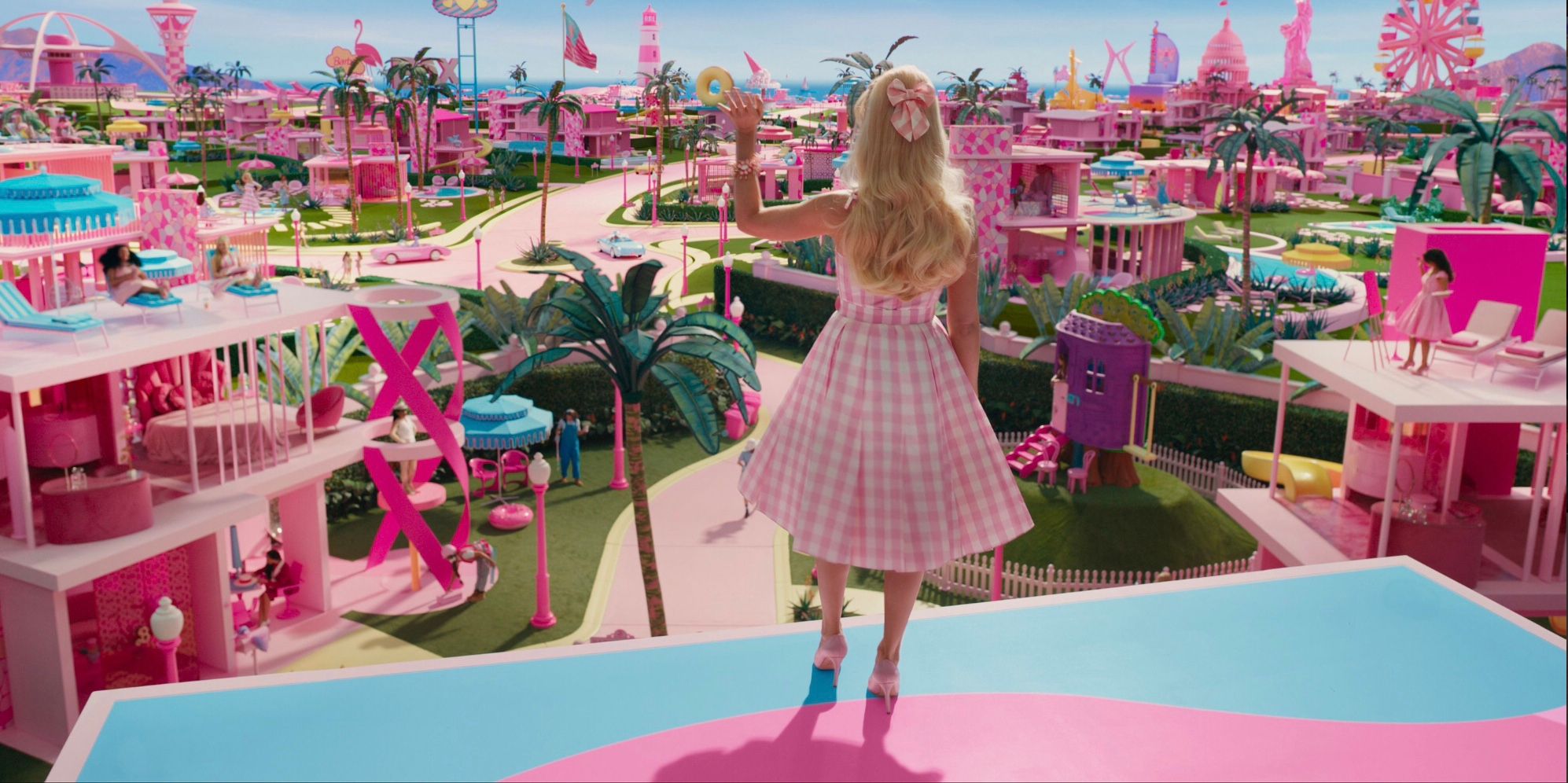 Barbie waves to all the other toy people in Barbieland
