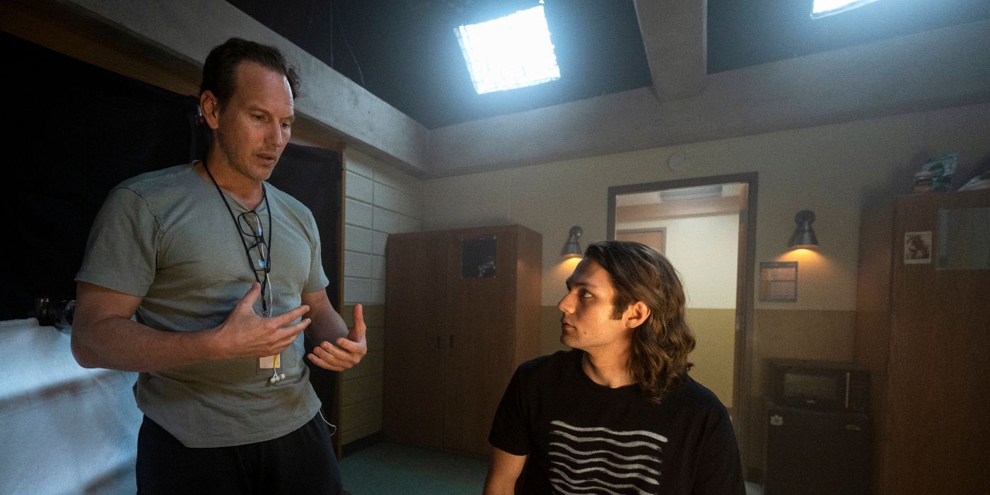 Patrick Wilson directing Ty Simpkins on the set of Insidious: The Red Door 