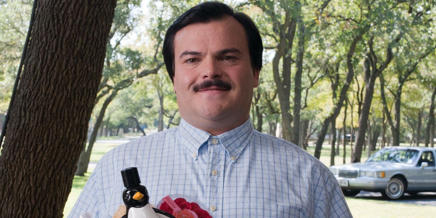 Jack Black as Bernie smiling at a person offscreen in Bernie (2011)