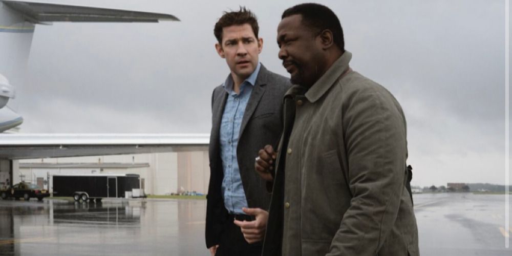 John Krasinski as Jack Ryan and Wendell Pierce as James Greer walking together in &lsquo;Jack Ryan.'