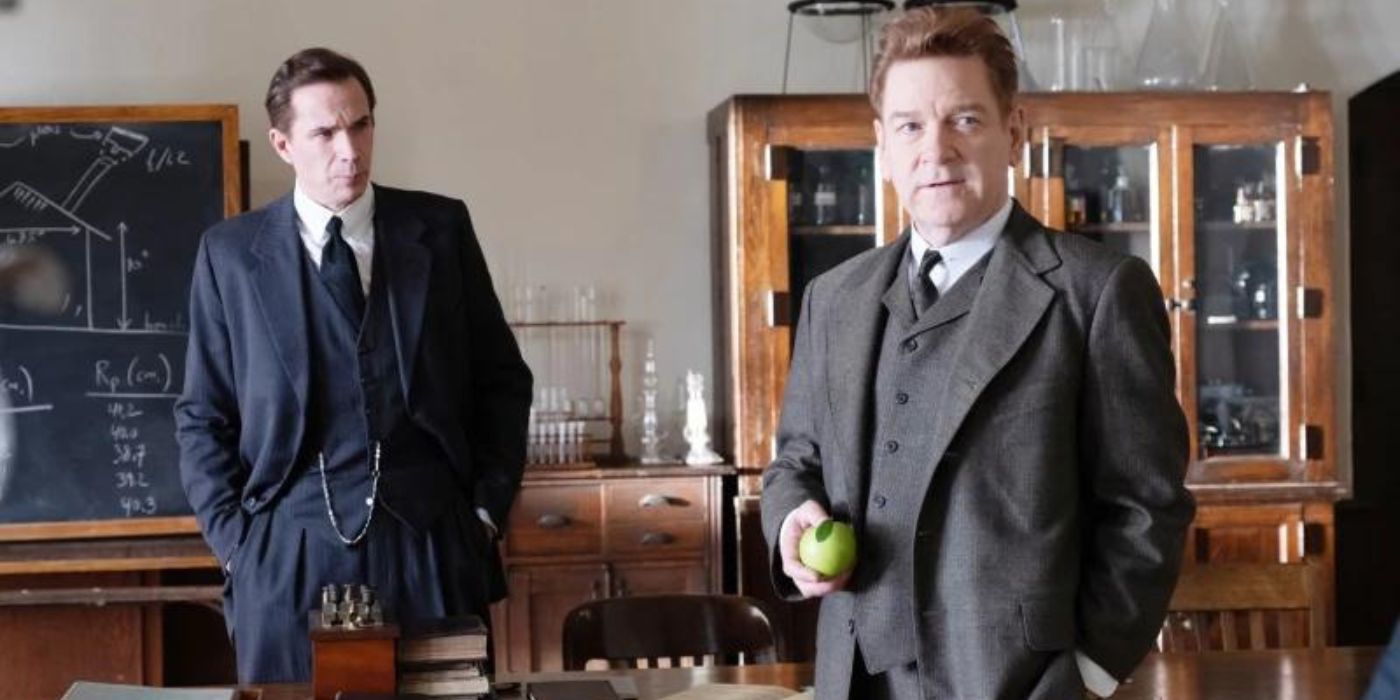 Patrick Blackett watching as Niels Bohr looks at someone off-camera in Oppenheimer