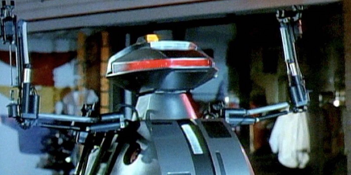 A robot raising its arms in Chopping Mall