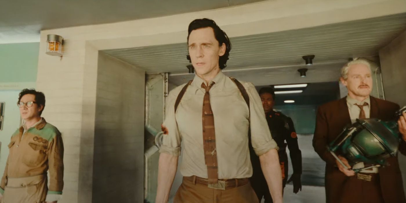 Tom Hiddleston as Loki standing with TVA agents in ‘Loki Season 2’