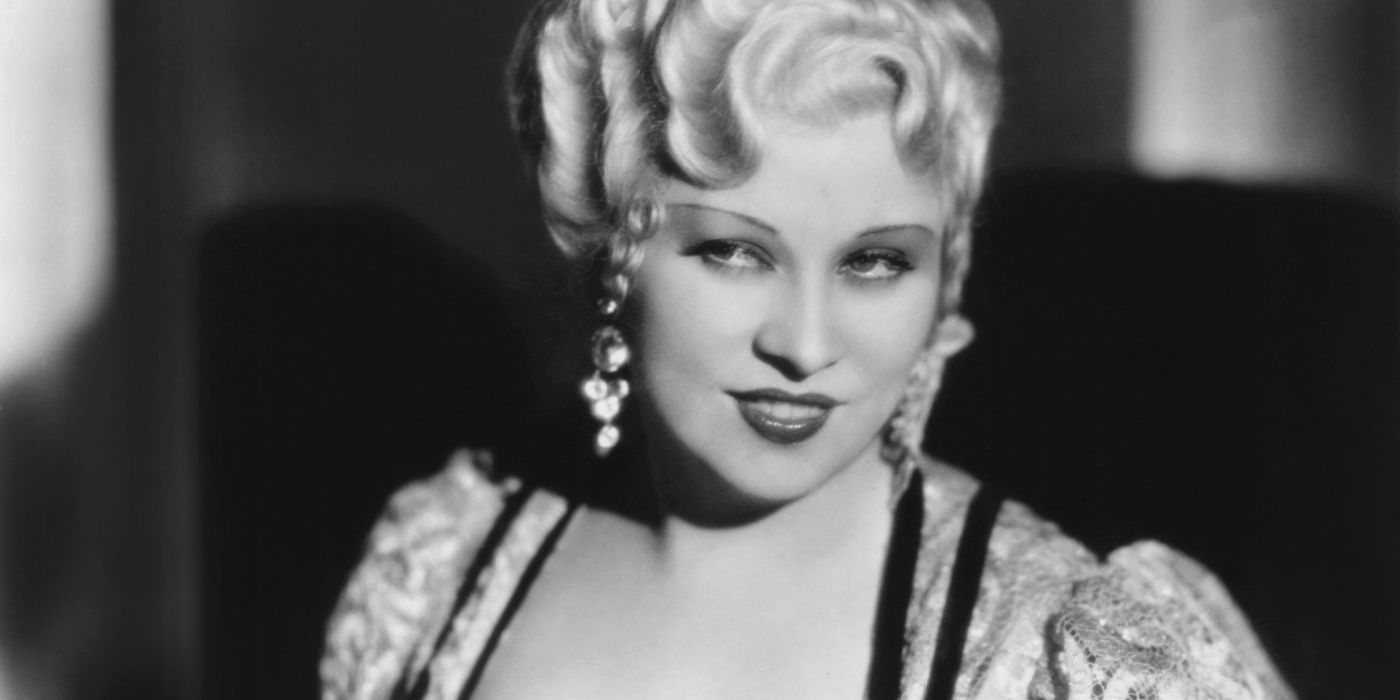 Mae West smiling in a publicity photo.
