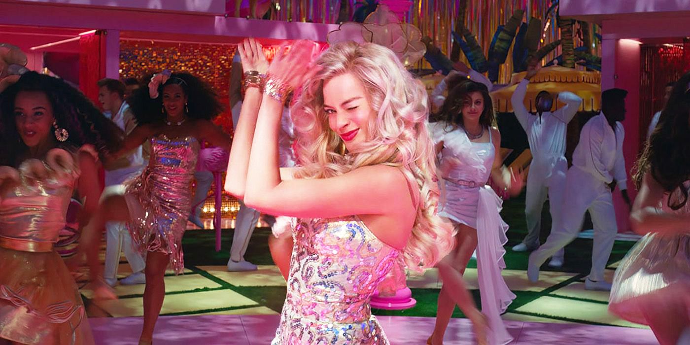 Margot Robbie as Barbie dancing at a party in Barbie.