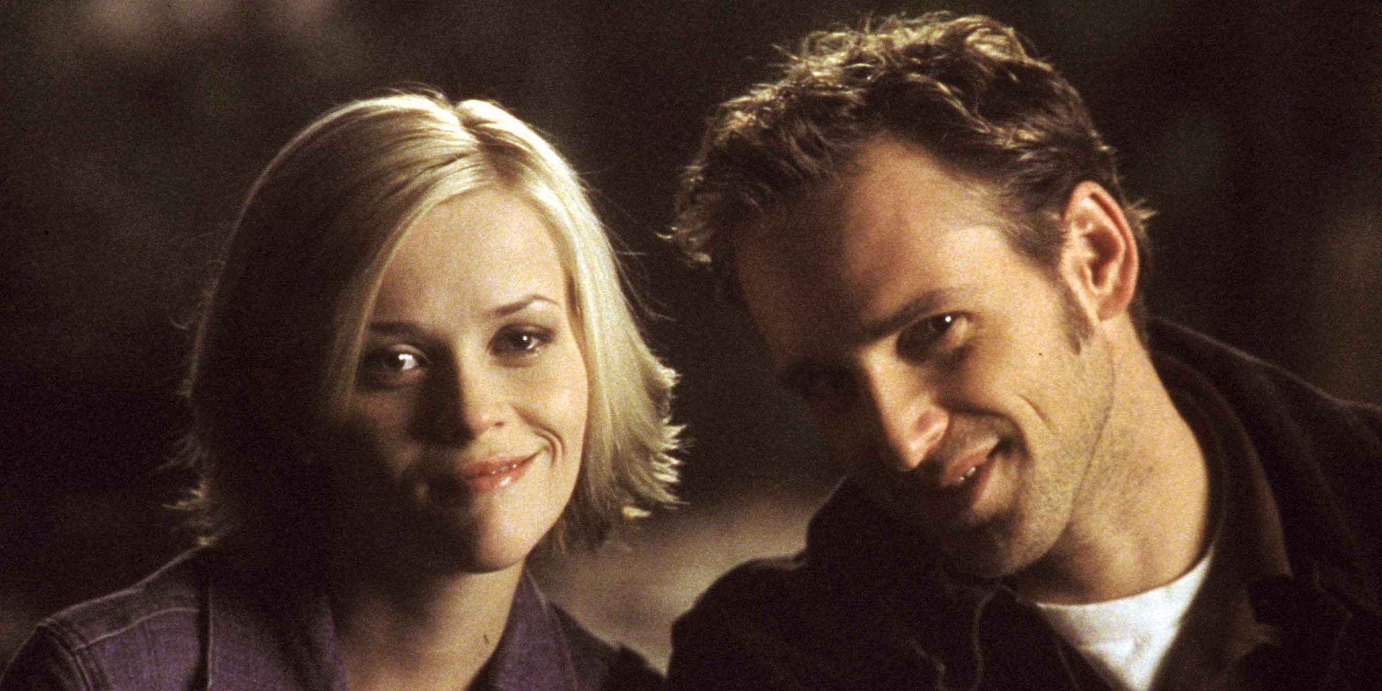 Melanie & Jake smiling and looking at the camera in Sweet Home Alabama