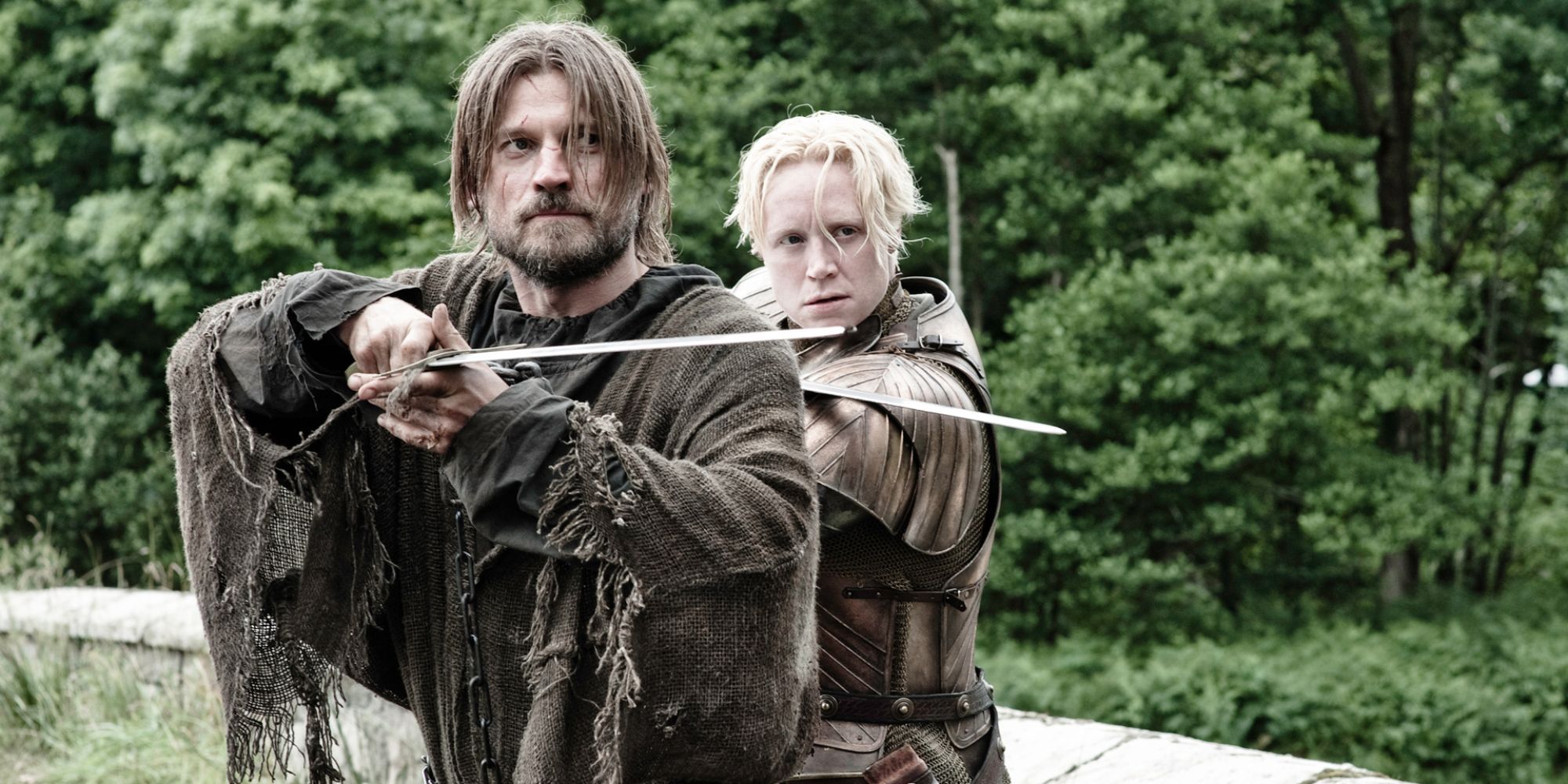 Jaime and Brienne stand side-by-side with swords at the ready