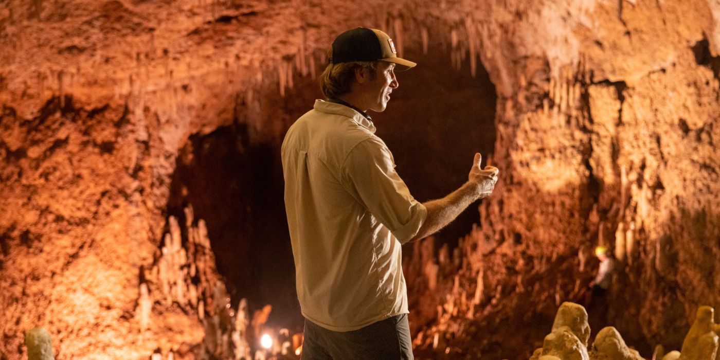 Jonas Pate filming a scene for Outer Banks Season 3 in a cave 