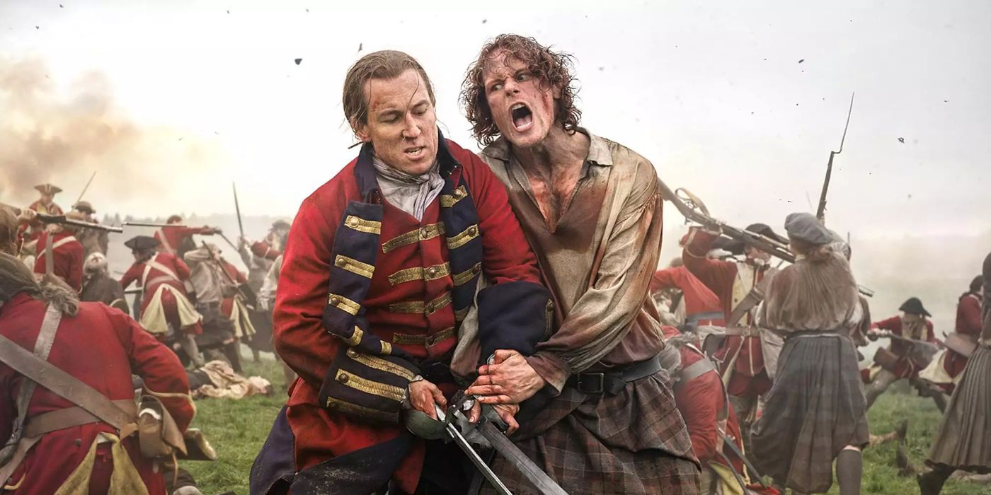 Sam Heughan as Jamie fights Tobias Menzies as Black Jack Randall at the Battle of Culloden in Outlander.