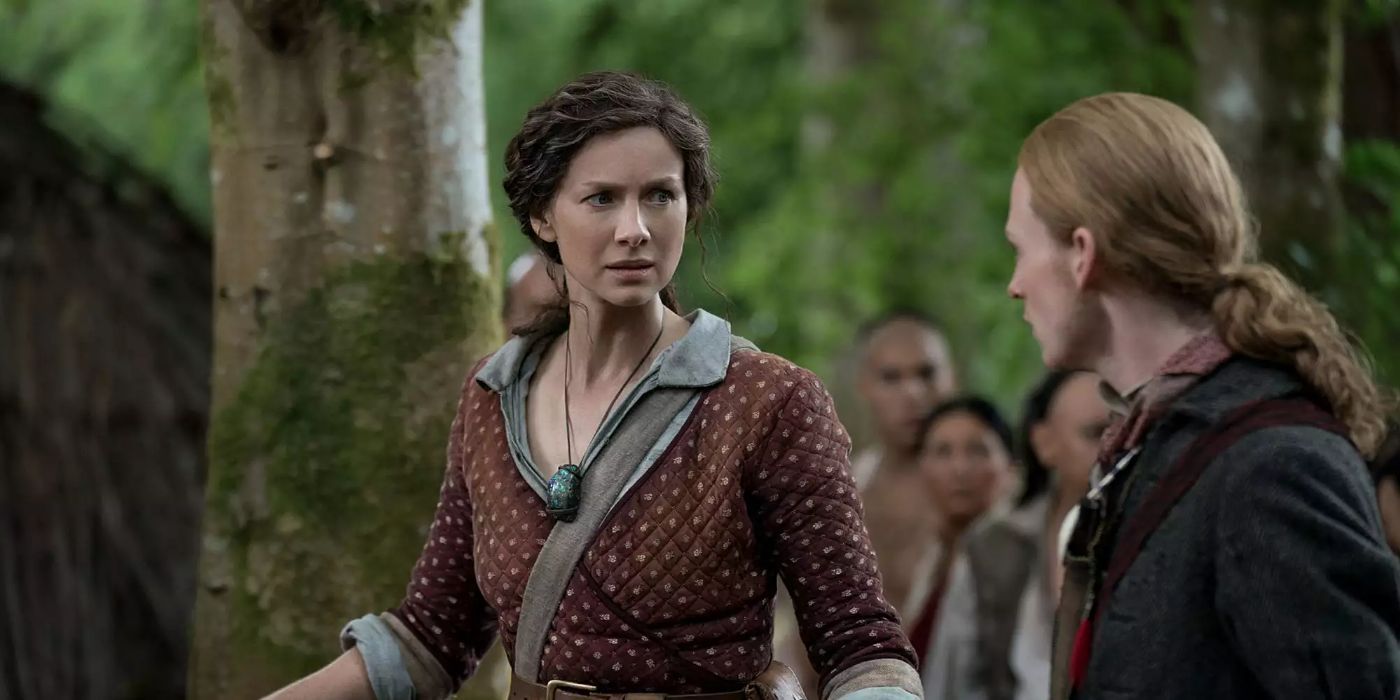 Claire, played by Caitriona Balfe, and Young Ian, played by John Bell, look at each other in Outlander.