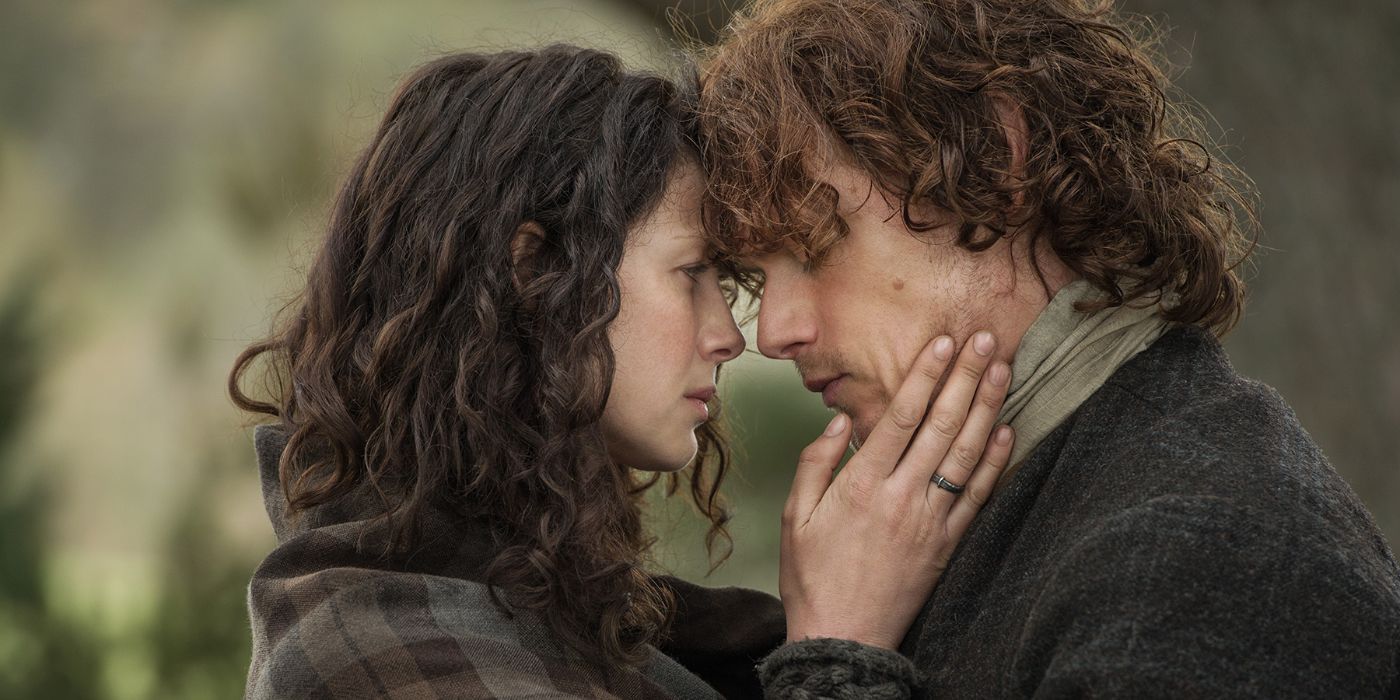 Claire, played by Caitriona Balfe, holding Jamie, played by Sam Heughan, in 'Outlander' Season 1, Episode 11.