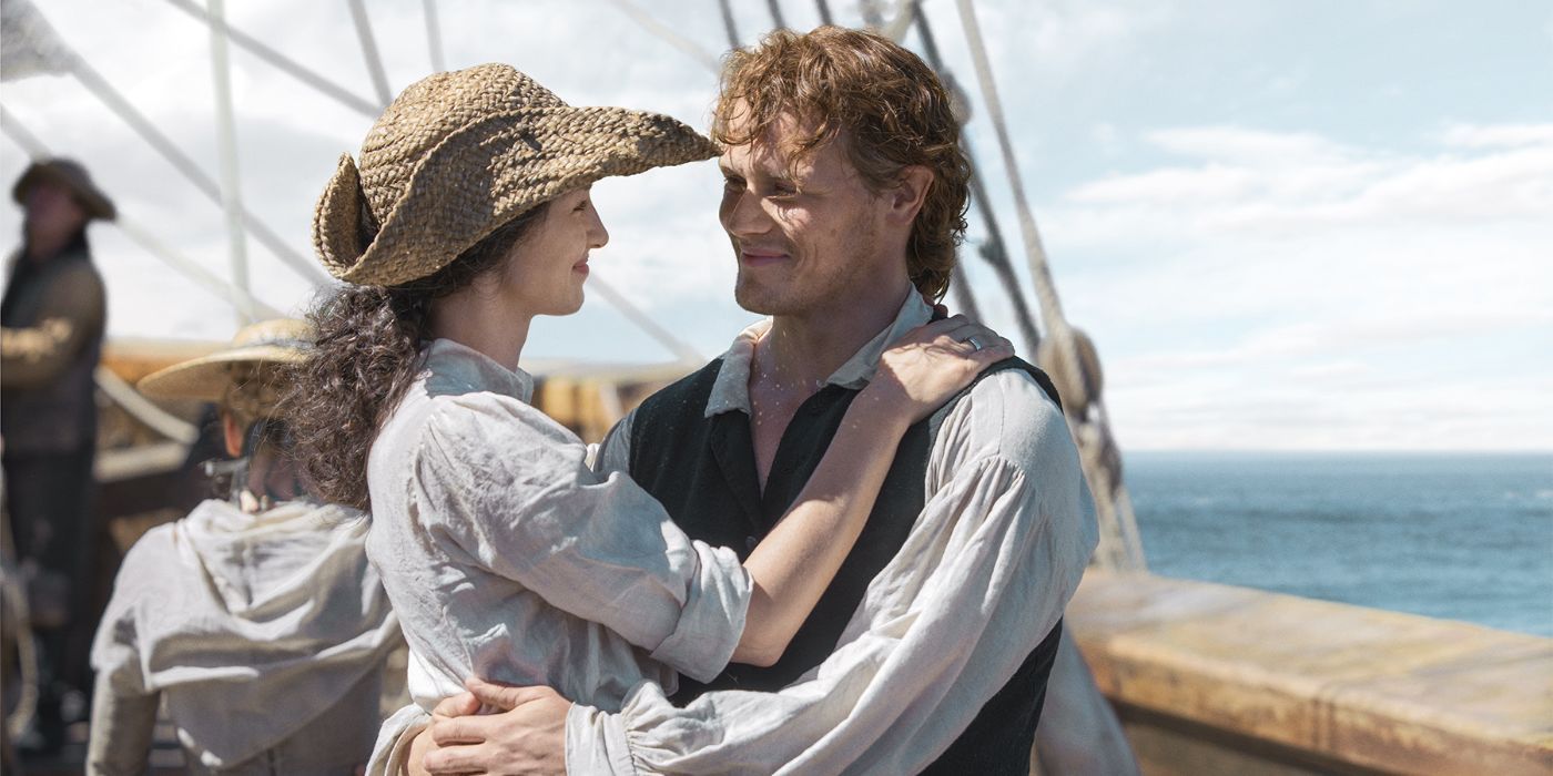 Claire, played by Caitriona Balfe, holding Jamie, Sam Heughan, on a boat in 'Outlander' Season 3, Episode 9.