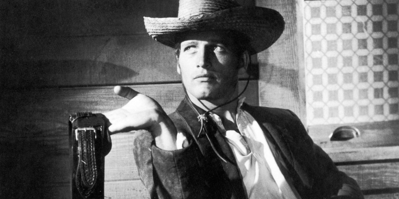 Paul Newman as Billy the Kid holding his belt up in 'The Left Handed Gun'