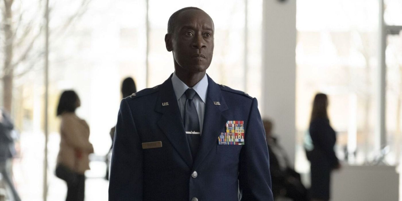 Rhodey wearing his uniform while standing still on a hallway in The Falcon and the Winter Soldier