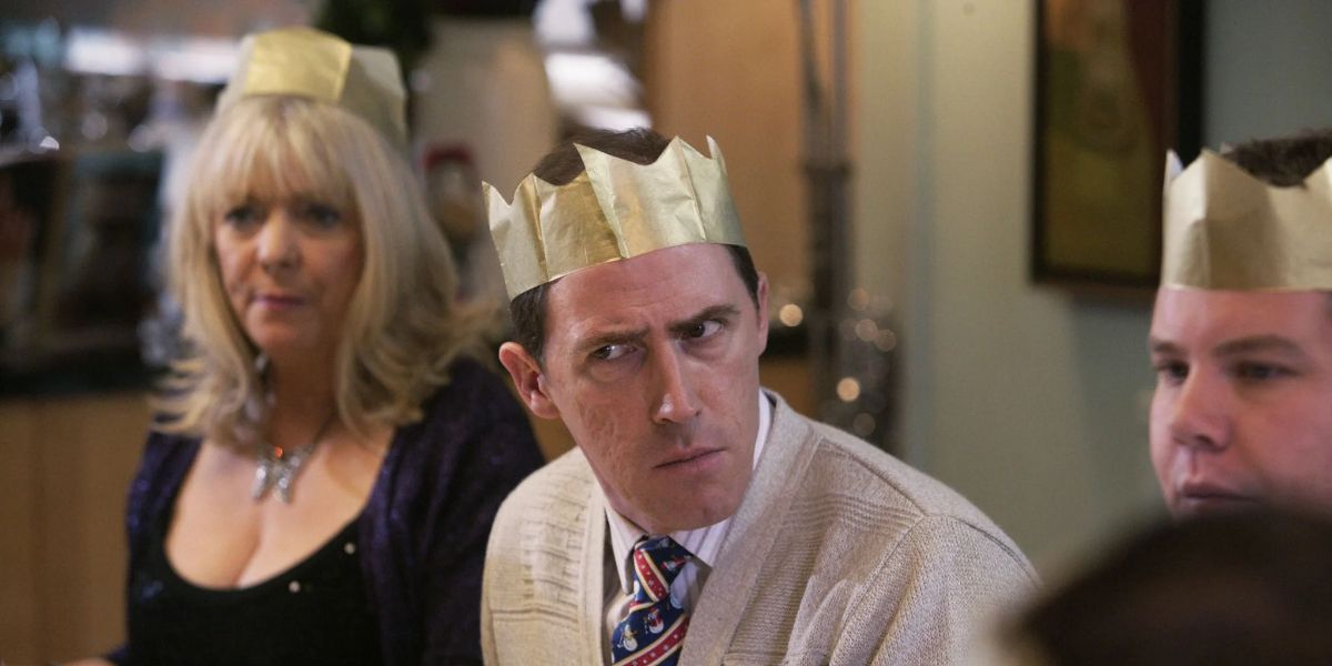 Rob Brydon as Bryn West looking confused at the dinner table in the BBC sitcom Gavin and Stacey