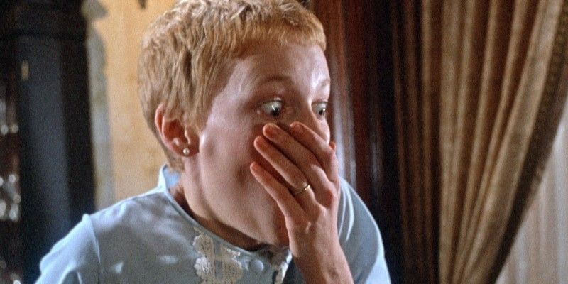 Still from Rosemary's Baby: Rosemary (Mia Farrow) looks horrified with her hand over her mouth.