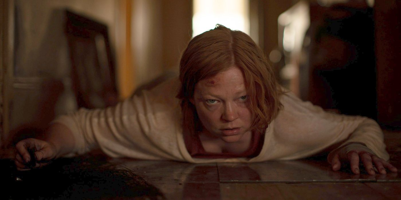 Sarah Snook lying on the floor in a scene from 'Run Rabbit Run.' 