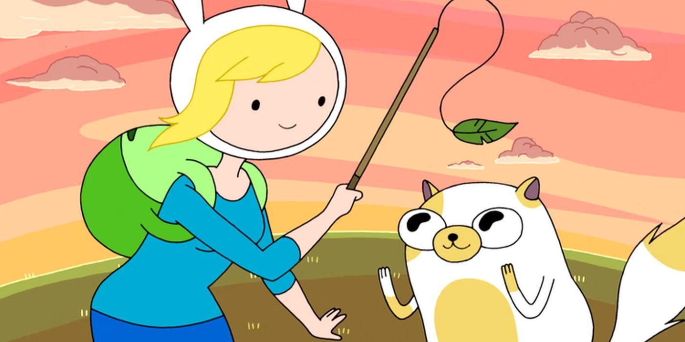 Fionna and Cake playing with a cat toy in Adventure Time