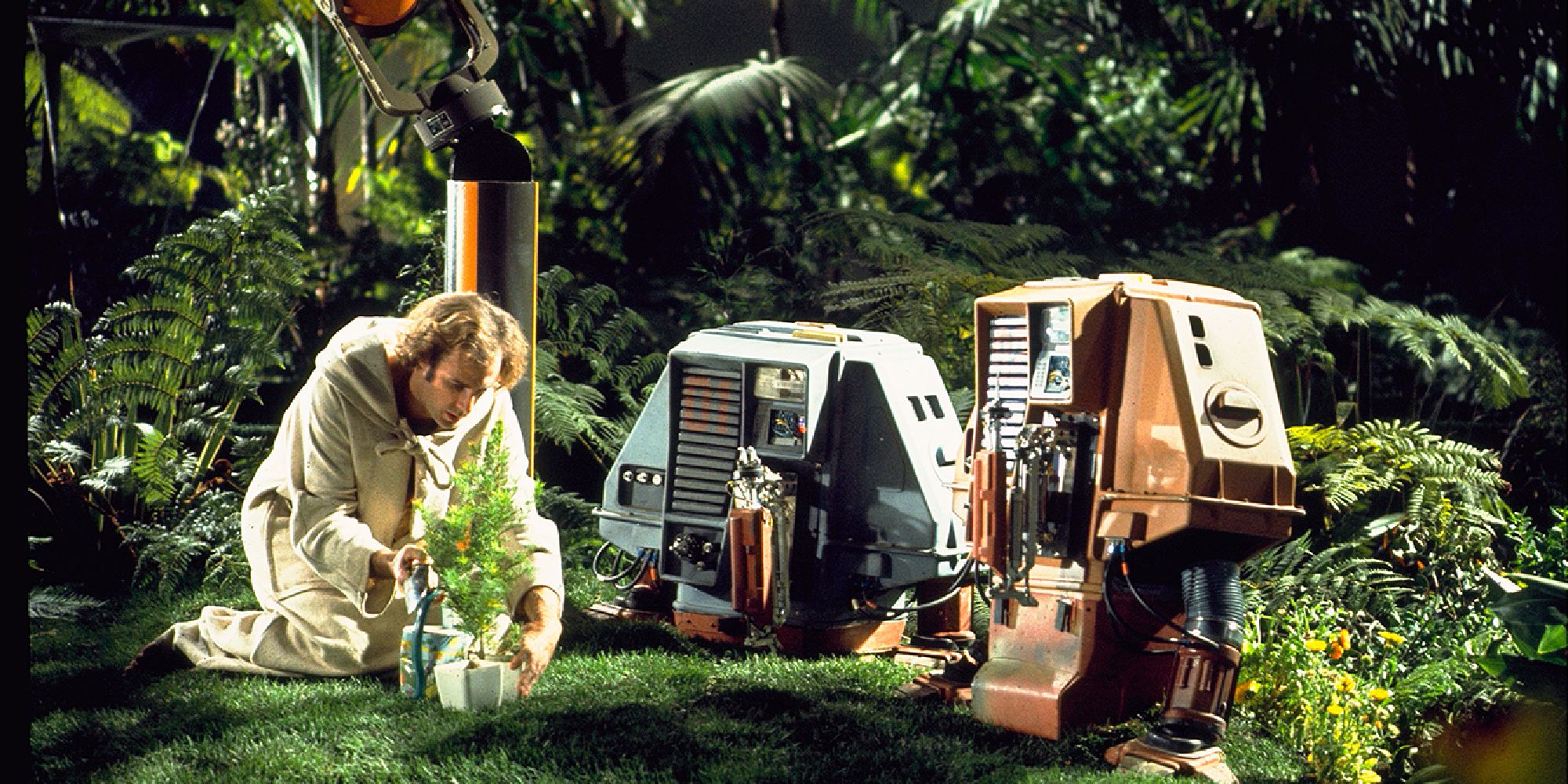 Bruce Dern in Silent Running touching a plant.