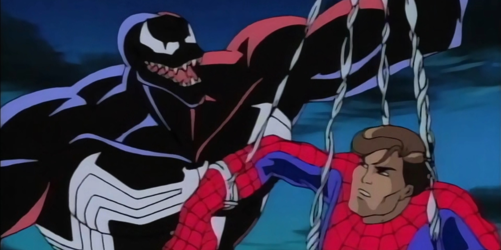 Venom holds an incognito Peter Parker in his web