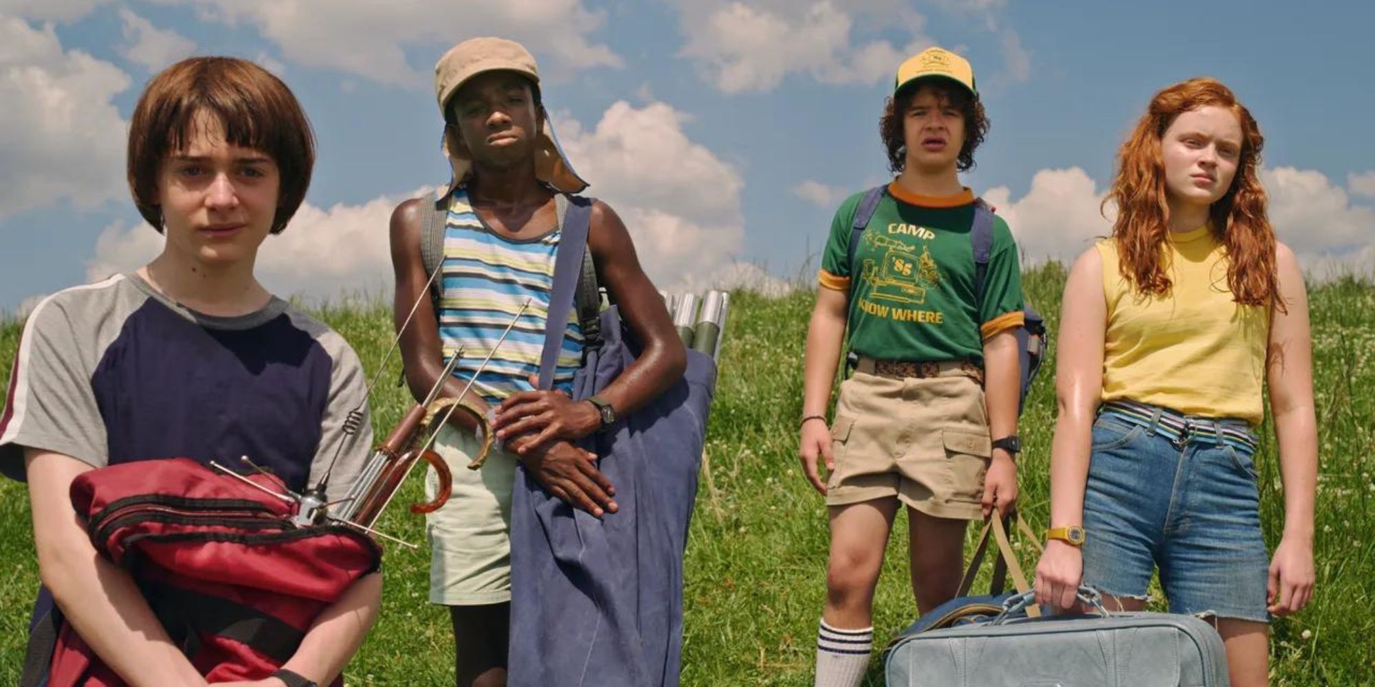 The kids from Stranger Things standing together