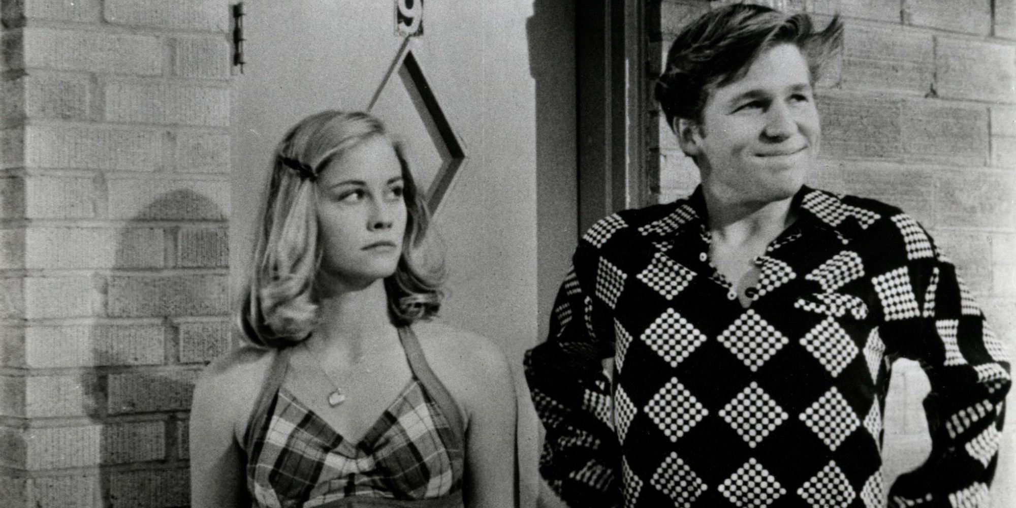 Cybil Shepherd as Jacy looks annoyed while Jeff Bridges as Duane smiles in The Last Picture Show