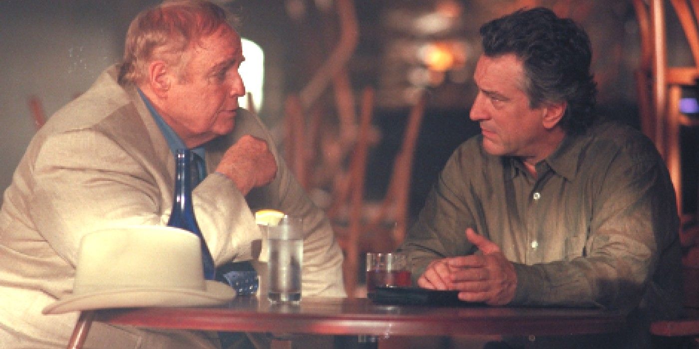 Max and Nick talking at a bar in The Score